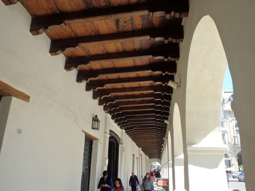 A covered portico reveals its old architecture.